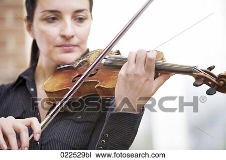 portrait of female violinist View Large Photo Image Stock Image - portrait of female violinist. Fotosearch