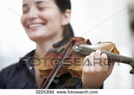 portrait of female violinist View Large Photo Image Stock Image - portrait of female violinist. Fotosearch