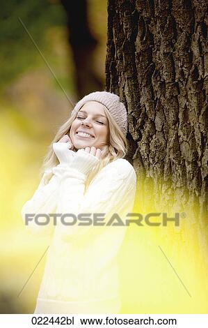 portrait of teenage girl leaning against tree View Large Photo Image Stock Image - portrait of teenage girl leaning against tree. Fotosearch