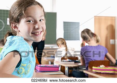 portrait of young girl in class View Large Photo Image Stock Image - portrait of young girl in class. Fotosearch
