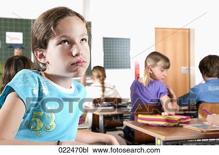 portrait of young girl in class View Large Photo Image Stock Image - portrait of young girl in class. Fotosearch