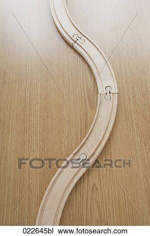 still life of bendy wooden toy train railway tracks View Large Photo Image Stock Image - still life of bendy wooden toy train railway tracks. Fotosearch