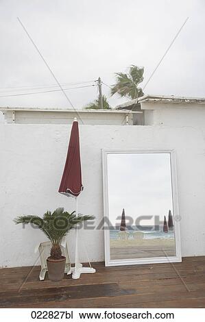 still life of mirror reflecting beach scenery at Saint Tropez in France View Large Photo Image Stock Image - still life of mirror reflecting beach scenery at Saint Tropez in France. Fotosearch