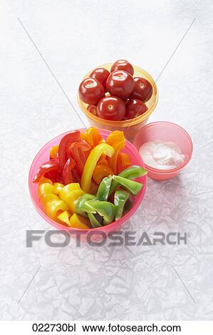 still life with bell pepper tomatos and cream cheese in bowls View Large Photo Image Stock Image - still life with bell pepper tomatos and cream cheese in bowls. Fotosearch