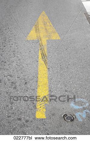 yellow arrow sign on road View Large Photo Image Stock Image - yellow arrow sign on road. Fotosearch