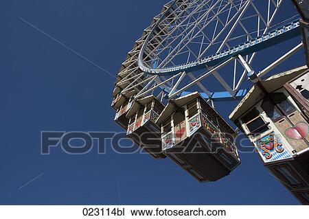Stock Image - big wheel at the munich oktoberfest. Fotosearch
