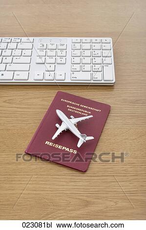 computer keyboard passport and toy airplane on table View Large Photo Image Stock Image - computer keyboard passport and toy airplane on table. Fotosearch