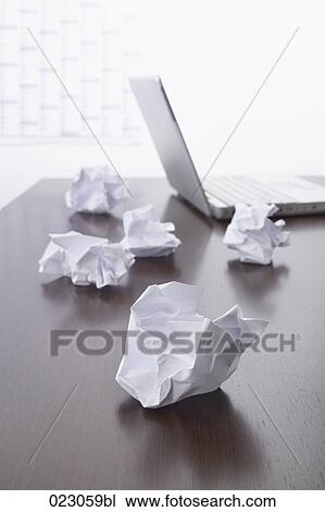 paper balls and laptop computer on table View Large Photo Image Stock Image - paper balls and laptop computer on table. Fotosearch