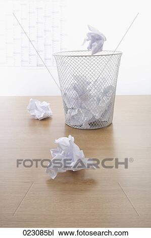 paper balls and wastebasket on table View Large Photo Image Stock Image - paper balls and wastebasket on table. Fotosearch
