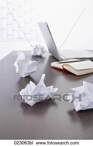 paper balls diary and laptop computer on table View Large Photo Image Stock Image - paper balls diary and laptop computer on table. Fotosearch