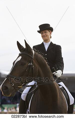 portrait of female dressage rider View Large Photo Image Stock Image - portrait of female dressage rider. Fotosearch