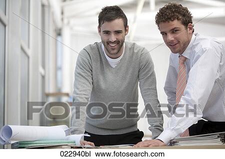 portrait of two young businessmen View Large Photo Image Stock Image - portrait of two young businessmen. Fotosearch