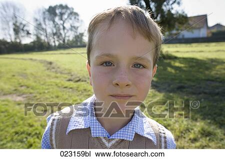 portrait of young boy on farm View Large Photo Image Stock Image - portrait of young boy on farm. Fotosearch