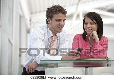 portrait of young businessman and businesswoman View Large Photo Image Stock Image - portrait of young businessman and businesswoman. Fotosearch