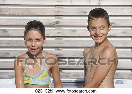 portrait of young girl and boy in summer View Large Photo Image Stock Image - portrait of young girl and boy in summer. Fotosearch