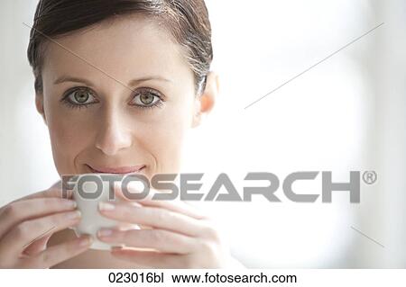 portrait of young woman with espresso cup View Large Photo Image Stock Image - portrait of young woman with espresso cup. Fotosearch