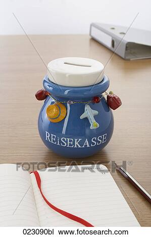 savings box for travel expenses on table View Large Photo Image Stock Image - savings box for travel expenses on table. Fotosearch