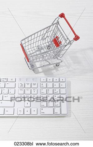 still life of computer keyboard and shopping trolley View Large Photo Image Stock Image - still life of computer keyboard and shopping trolley. Fotosearch