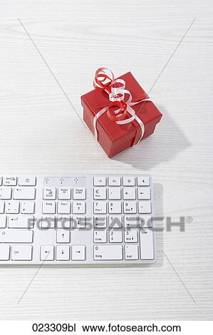 still life of computer keyboard and present View Large Photo Image Stock Image - still life of computer keyboard and present. Fotosearch