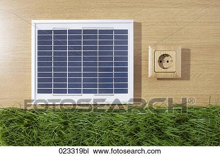 still life of solar panel wooden power socket and grass View Large Photo Image Stock Image - still life of solar panel wooden power socket and grass. Fotosearch