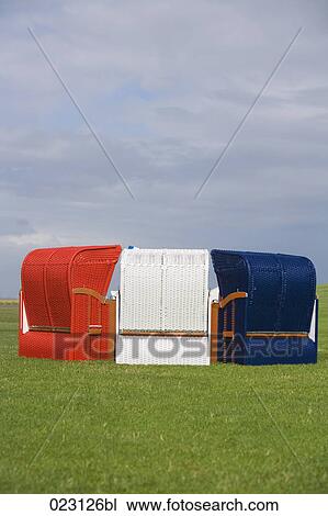 three beach chairs on meadow View Large Photo Image Stock Image - three beach chairs on meadow. Fotosearch