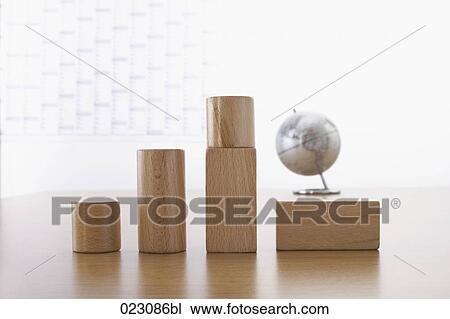Stock Image - wooden pieces showing upward development. Fotosearch