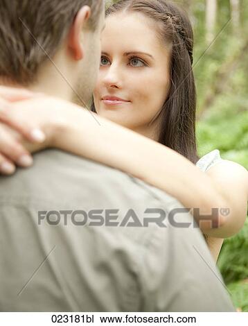 Stock Image - young couple in tender embrace. Fotosearch