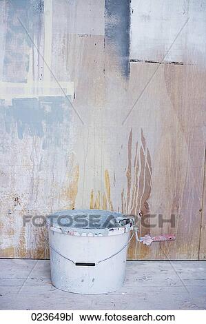 bucket and paint roller in front of wall View Large Photo Image Stock Image - bucket and paint roller in front of wall. Fotosearch