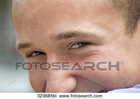 Stock Image - close-up of young man´s face. Fotosearch