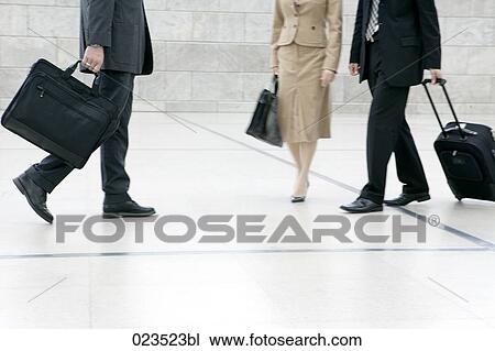 detail of business people with suitcases View Large Photo Image Stock Image - detail of business people with suitcases. Fotosearch