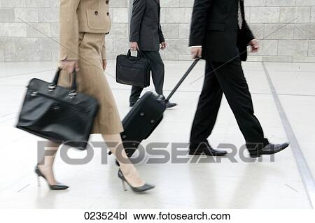 detail of business people with suitcases View Large Photo Image Stock Image - detail of business people with suitcases. Fotosearch