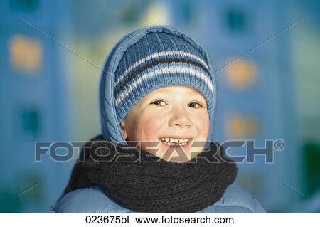 headshot of young boy in winter clothes View Large Photo Image Stock Image - headshot of young boy in winter clothes. Fotosearch