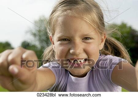 headshot of young girl in park View Large Photo Image Stock Image - headshot of young girl in park. Fotosearch