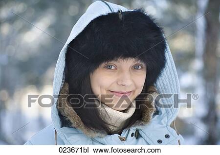 headshot of young woman in winter clothes View Large Photo Image Stock Image - headshot of young woman in winter clothes. Fotosearch