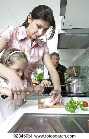 mother cooking with her children View Large Photo Image Stock Image - mother cooking with her children. Fotosearch