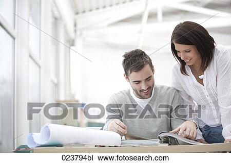 portrait of businessman and female colleague View Large Photo Image Stock Image - portrait of businessman and female colleague. Fotosearch