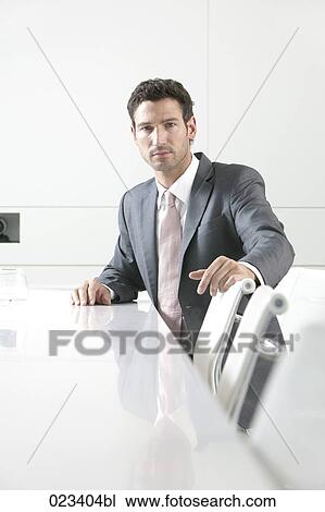 portrait of businessman in meeting room View Large Photo Image Stock Image - portrait of businessman in meeting room. Fotosearch