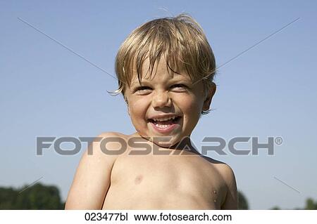 portrait of happy young boy View Large Photo Image Stock Image - portrait of happy young boy. Fotosearch