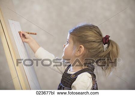 portrait of little girl drawing View Large Photo Image Stock Image - portrait of little girl drawing. Fotosearch
