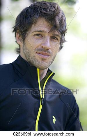 portrait of male cyclist View Large Photo Image Stock Image - portrait of male cyclist. Fotosearch