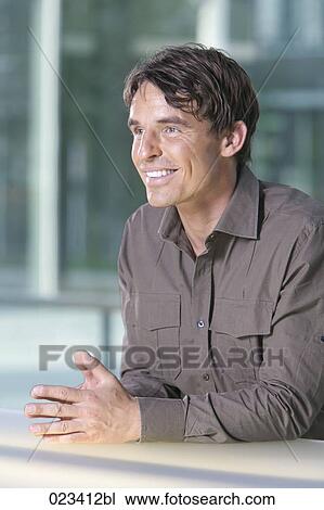 portrait of smiling businessman View Large Photo Image Stock Image - portrait of smiling businessman. Fotosearch
