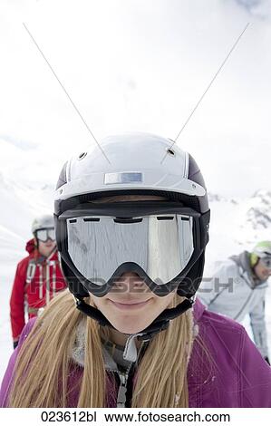 portrait of woman wearing ski goggles and helmet View Large Photo Image Stock Image - portrait of woman wearing ski goggles and helmet. Fotosearch