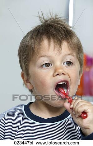 portrait of young boy brushing his teeth View Large Photo Image Stock Image - portrait of young boy brushing his teeth. Fotosearch