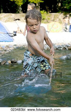 portrait of young boy fishing View Large Photo Image Stock Image - portrait of young boy fishing. Fotosearch