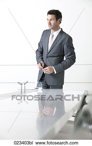 portrait of young businessman in meeting room View Large Photo Image Stock Image - portrait of young businessman in meeting room. Fotosearch