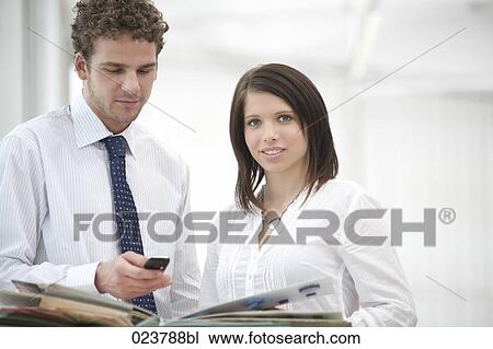 portrait of young businesswoman and male colleague View Large Photo Image Stock Image - portrait of young businesswoman and male colleague. Fotosearch