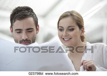 portrait of young businesswoman and male colleague View Large Photo Image Stock Image - portrait of young businesswoman and male colleague. Fotosearch