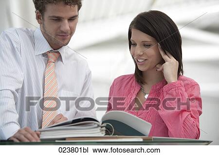 portrait of young businesswoman and male colleague View Large Photo Image Stock Image - portrait of young businesswoman and male colleague. Fotosearch