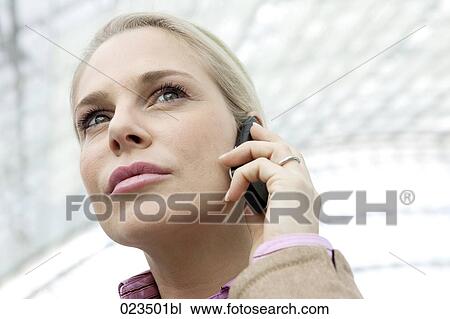portrait of young businesswoman talking on mobile phone View Large Photo Image Stock Image - portrait of young businesswoman talking on mobile phone. Fotosearch