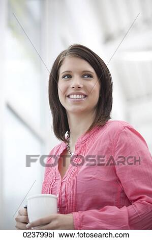 portrait of young businesswoman with coffee cup View Large Photo Image Stock Image - portrait of young businesswoman with coffee cup. Fotosearch